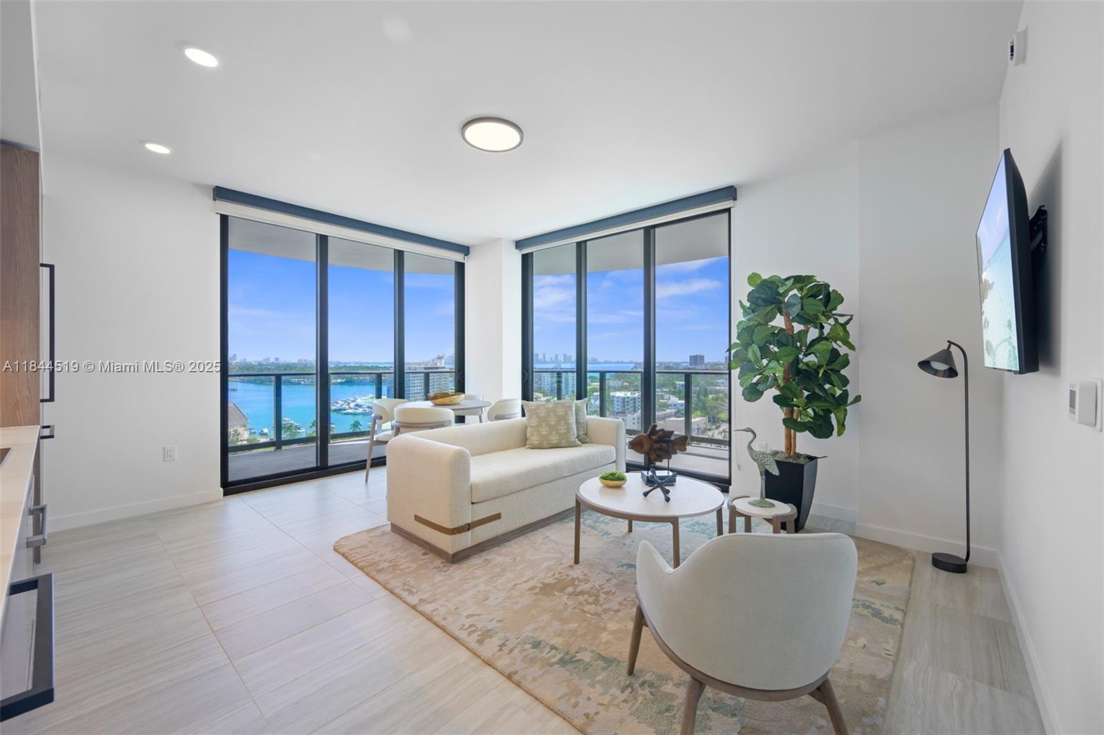Stunning 2BD/2BA ADA Unit at 72 Park | Ocean & Intracoastal Views | Fully Furnished, Move-in ready! This beautifully furnished and fully equipped 2-bedroom, 2-bath ADA unit at the brand-new 72 Park offers spectacular ocean and Intracoastal views from a spacious wrap-around terrace. Featuring an open floor plan, modern kitchen with high-end appliances, floor-to-ceiling windows, and sleek finishes throughout. Split-bedroom layout provides privacy and comfort. The unit includes washer/dryer, smart home features, and comes stocked with linens, towels, and kitchen essentials — just bring your suitcase! Enjoy full-service amenities including a rooftop pool, fitness center, valet, concierge, and more. Steps from the beach, parks, dining, and shops. Pet-friendly.