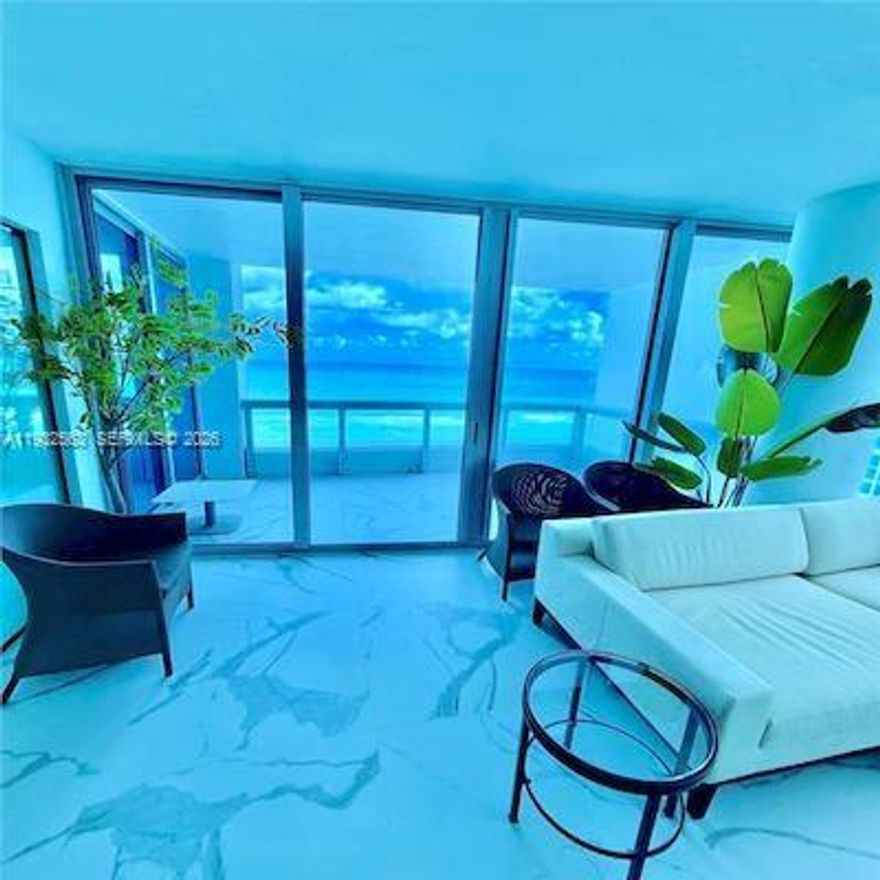 Live the ultimate ocean view lifestyle in this impeccably renovated 2 bedroom, 2 bath corner residence at the prestigious Carillon Miami Wellness Resort North Tower. Completed in 2024, this stunning home features a full, no-expense-spared renovation blending modern luxury with serene coastal living.

Floor to ceiling custom windows, with electric blackout at the touch of a button, fill the home with natural light and frame breathtaking Atlantic sunrises. Step onto your private oceanfront terrace to enjoy morning coffee with the sound of the waves or relax as the sky transforms at dusk. Sleek tile flooring flows throughout the interior and balcony, enhancing the clean, contemporary design.

The open-concept chef’s kitchen impresses with top-of-the-line appliances, custom lighting, and bespoke cabinetry. Refined finishes continue throughout. The primary suite boasts a truly astonishing direct ocean view, with the tenth floor location offering engagement with the beach, making every morning feel like living in a retreat.

Residents enjoy five-star resort living with access to Carillon’s award-winning 70,000 square foot spa and fitness center, four oceanfront pools, private beach service, valet, concierge, 24-hour security, dining and lounge options, and 100+ weekly wellness classes.

Ideally located near Bal Harbour Shops, dining, cafés, groceries, and the Miami Beach boardwalk, this residence offers luxury, wellness, and convenience in one exceptional oceanfront home.