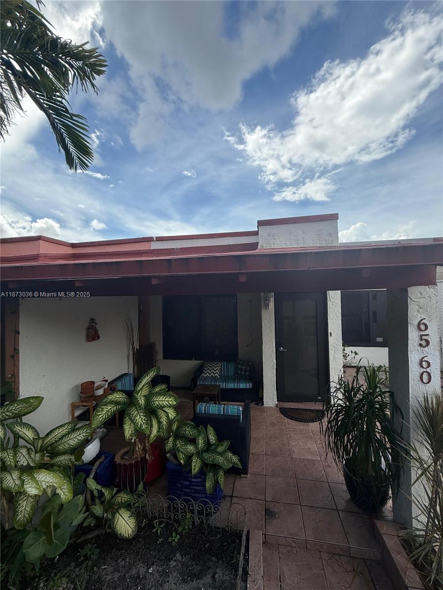 Charming 3-Bedroom Home in Prime Hialeah Location! Proudly owned by only one owner, this well-maintained property offers comfort, convenience, and space. Featuring impact windows, central A/C, ceiling fans, and tile floors throughout, the home is designed for easy living. The kitchen boasts stainless steel appliances, while a washer and dryer are included for added convenience. Enjoy outdoor living in the large covered backyard—perfect for entertaining—with a recent roof on the porch and backyard area. The driveway accommodates up to 4 cars, ideal for guests or a growing household. Located close to schools and retail, this Hialeah home combines suburban peace with urban convenience. Don't miss this rare opportunity to own a lovingly cared-for home in a sought-after neighborhood!