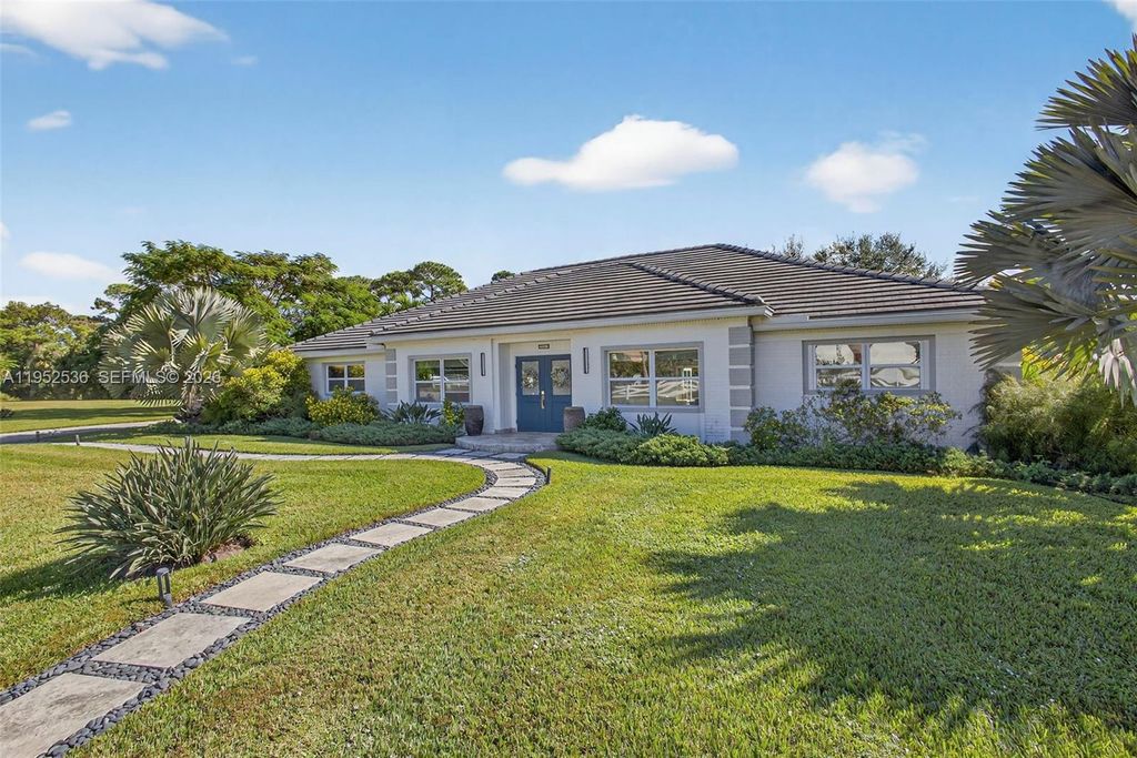 Photo of 5060 Mongo Way, Palm Beach Gardens, FL 33418 (MLS # A11952536)