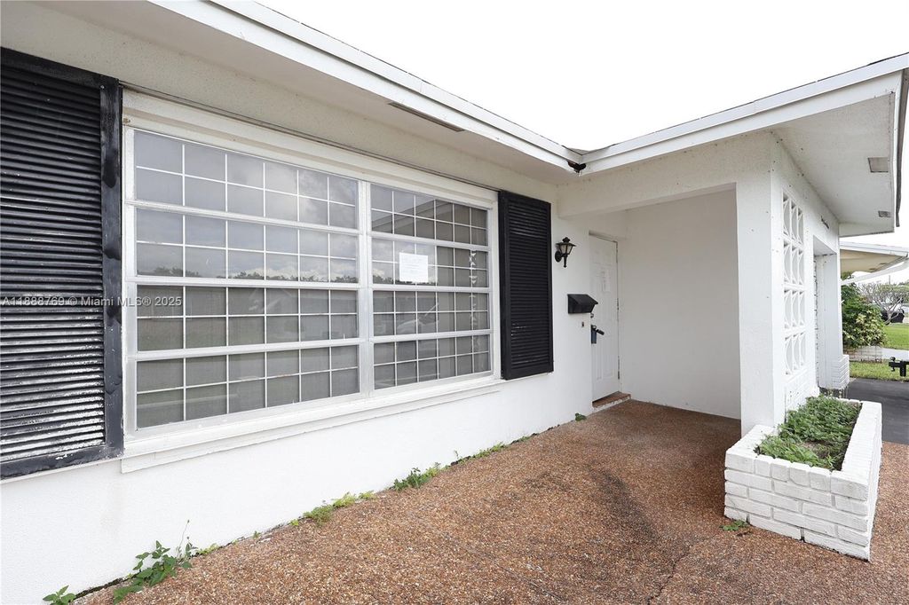 Photo of 4716 NW 48th Ave, Tamarac, FL 33319 (MLS # A11888769)