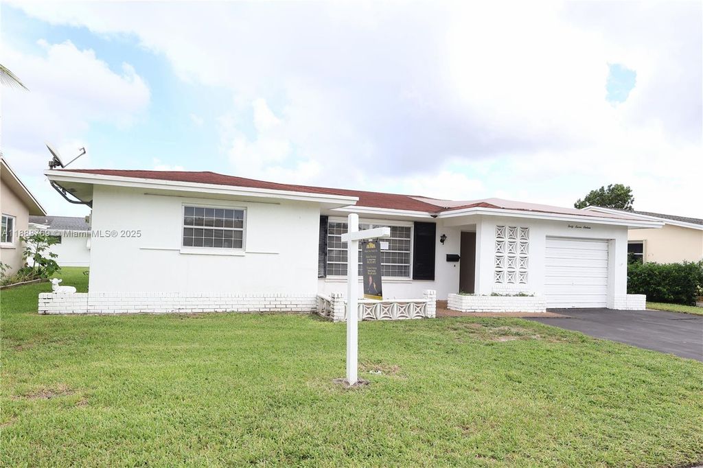 Photo of 4716 NW 48th Ave, Tamarac, FL 33319 (MLS # A11888769)