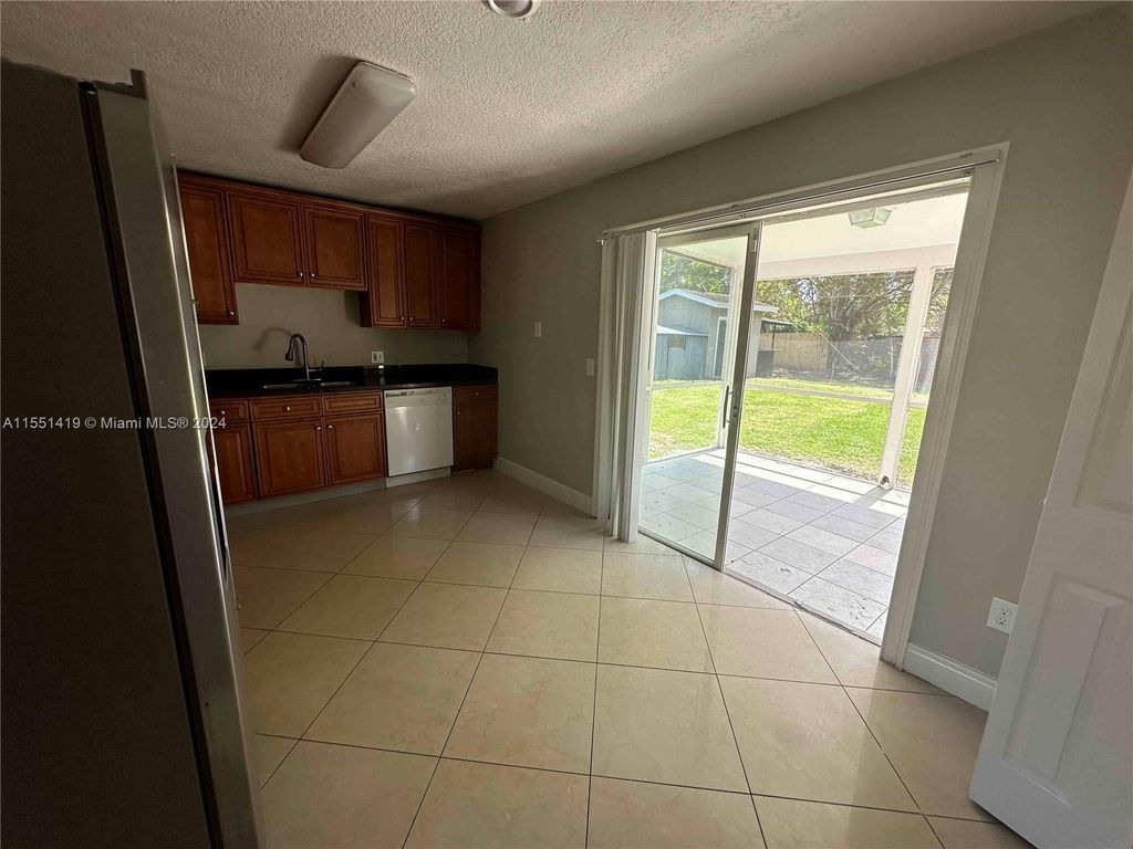 Photo of 3880 Sierra Dr, Palm Springs, FL 33461 (MLS # A11551419)