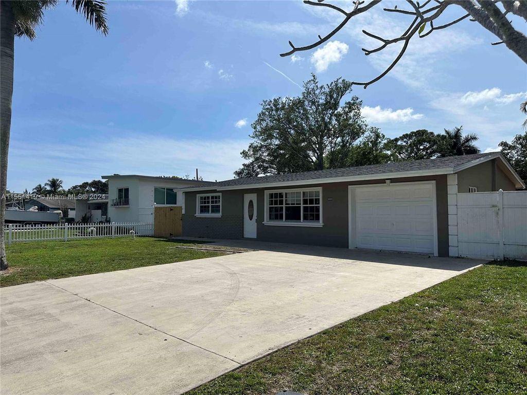 Photo of 3880 Sierra Dr, Palm Springs, FL 33461 (MLS # A11551419)