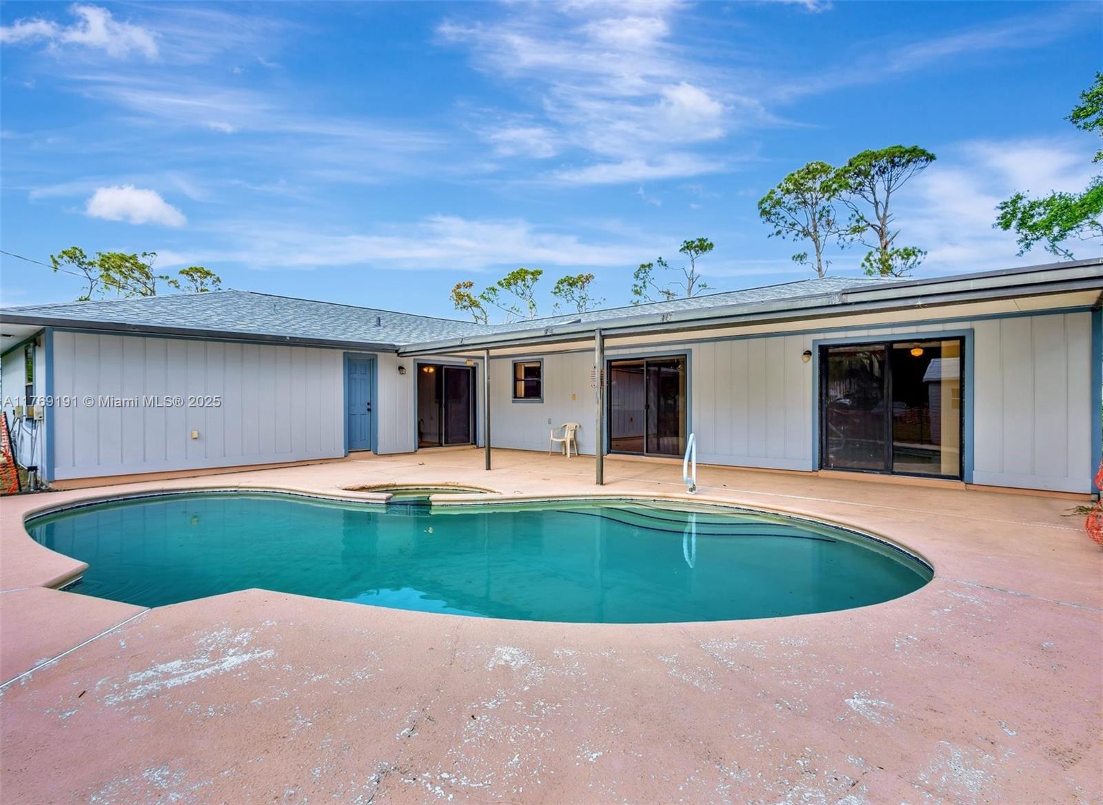 ** Seller concessions of $10,000.00 towards the buyer's closing cost **. The Lakewood Park community provides a tranquil living experience along Florida's Treasure Coast. This beautiful spacious 3/2 home has a heated pool and spa. Freshly painted inside and out. The roof was replaced in 2022, and the air conditioner was replaced in 2018. The house comes with a complete set of hurricane shutters and a large shed located behind the house. The house is situated on 1/4 of an acre. St Lucie public schools is a school choice district based on availability. The property is vacant and easy to show
