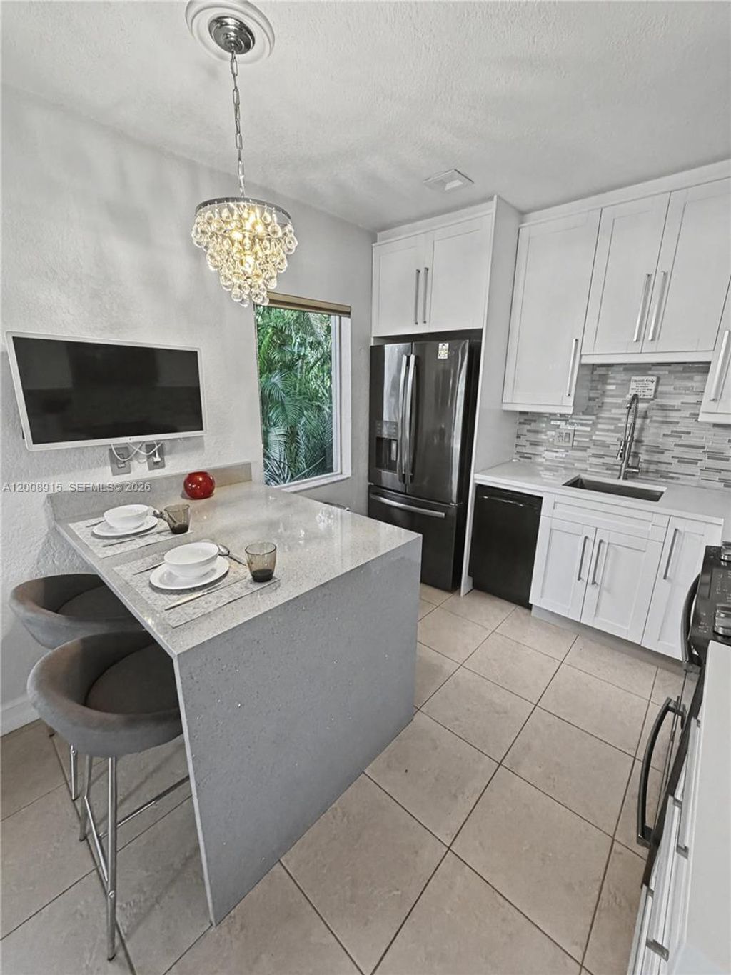 Photo of 1423 Holly Heights Dr #11, Fort Lauderdale, FL 33304 (MLS # A12008915)