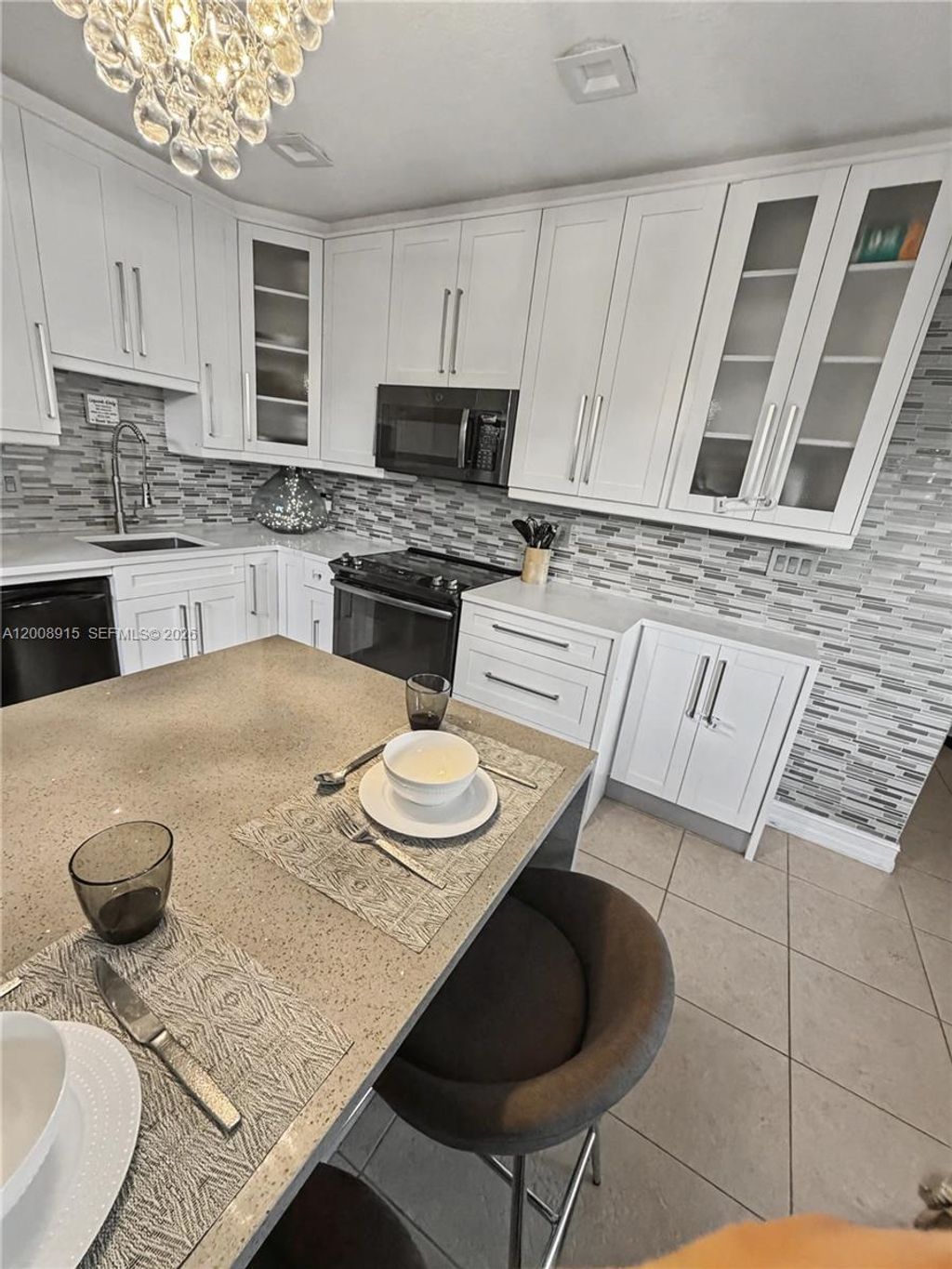 Photo of 1423 Holly Heights Dr #11, Fort Lauderdale, FL 33304 (MLS # A12008915)