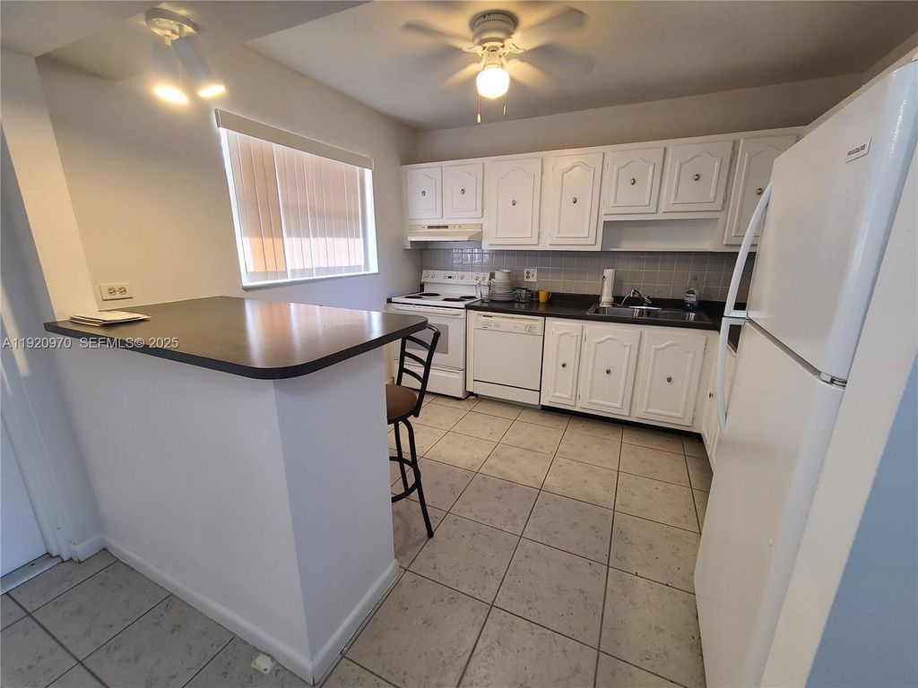 Photo of 6550 Royal Palm Blvd #112A, Margate, FL 33063 (MLS # A11920970)