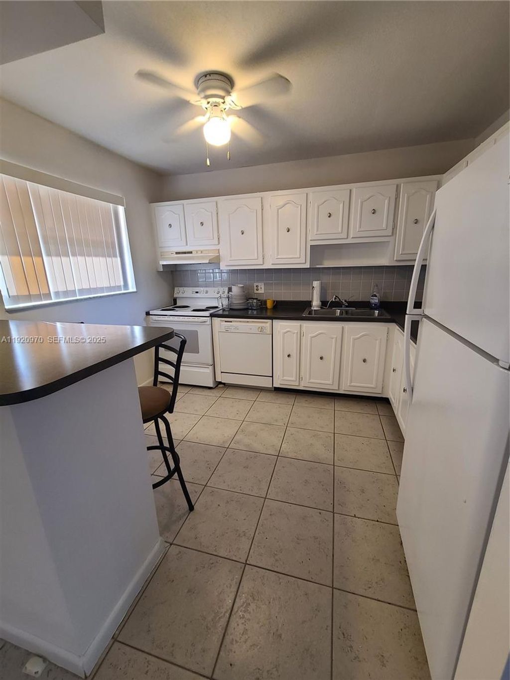 Photo of 6550 Royal Palm Blvd #112A, Margate, FL 33063 (MLS # A11920970)