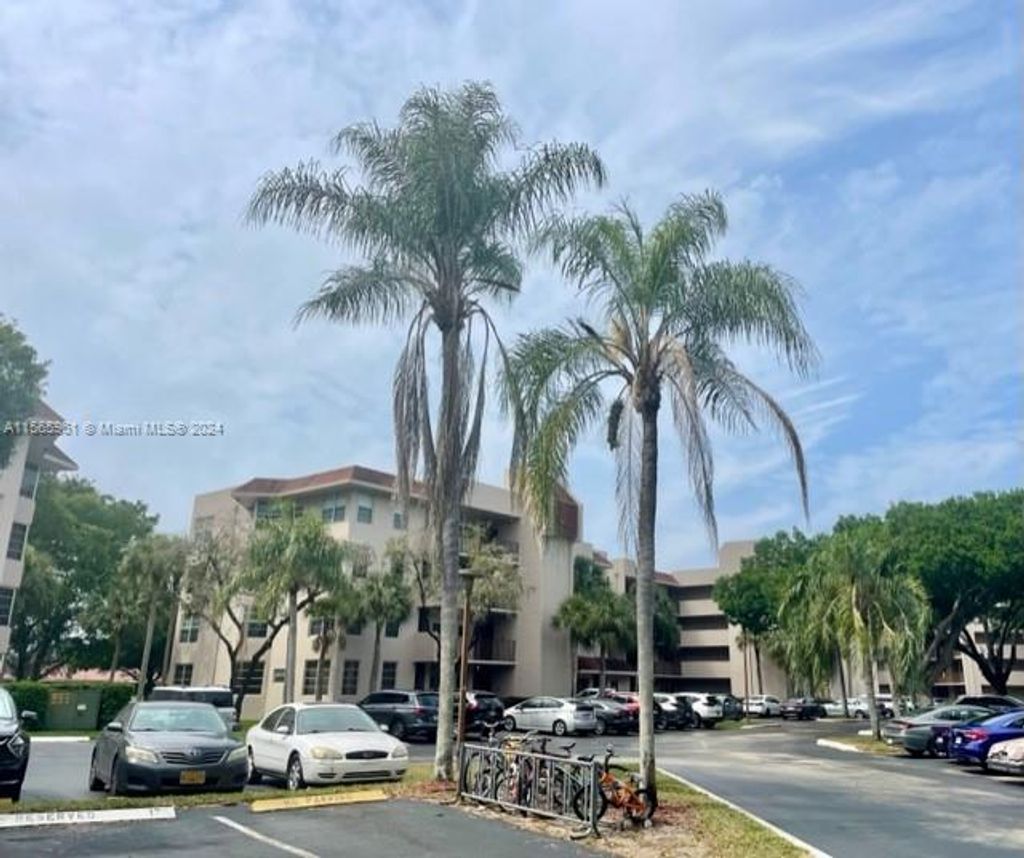 Photo of 9520 Seagrape Dr #406, Davie, FL 33324 (MLS # A11565961)