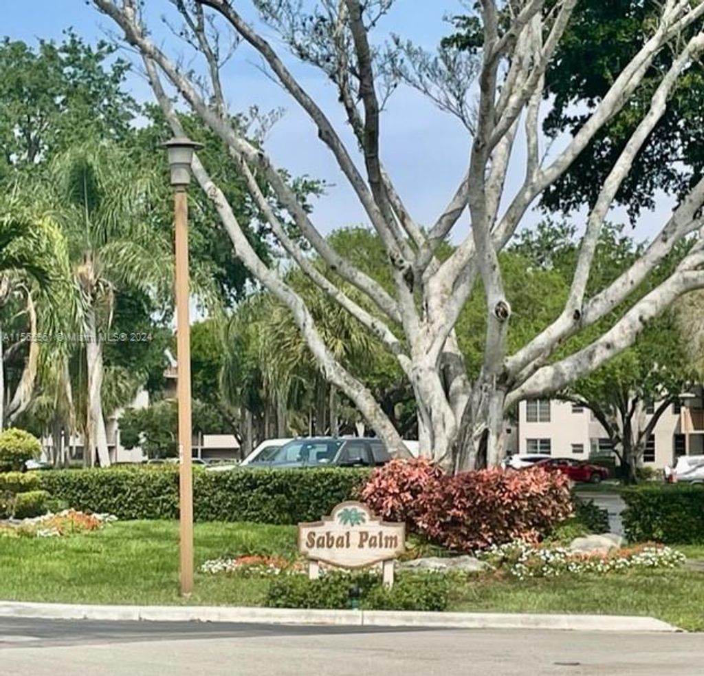 Photo of 9520 Seagrape Dr #406, Davie, FL 33324 (MLS # A11565961)