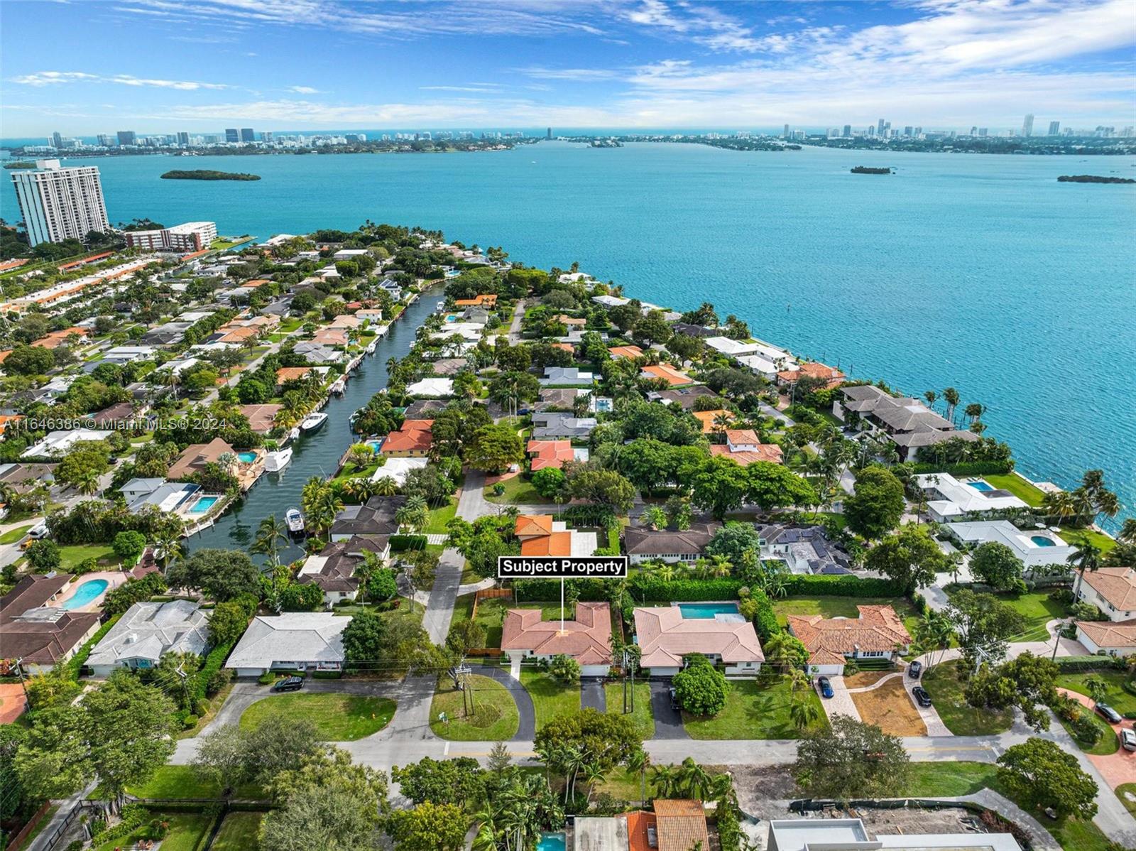 Welcome to this modernized 3 BD/2.5 BA home nestled on a spacious 11,300 SF corner lot in the heart of Miami Shores - East of Biscayne Blvd! This renovated residence boasts stunning high-end finishes throughout & spans nearly 2,200 SF. Prepare to be captivated by the abundance of natural light that floods this home. The sleek designer kitchen features new appliances & opens up directly to the main dining area. The primary suite features a large walk-in closet & spa-like bathroom w/2 sinks & rainfall shower. The additional 2 bedrooms are generous in size & boast walk-in closets. The 2 car garage & massive circular driveway allow for ample parking. The backyard features a new expansive deck & endless possibilities w/room for a pool. Don't miss this opportunity to live in this location!