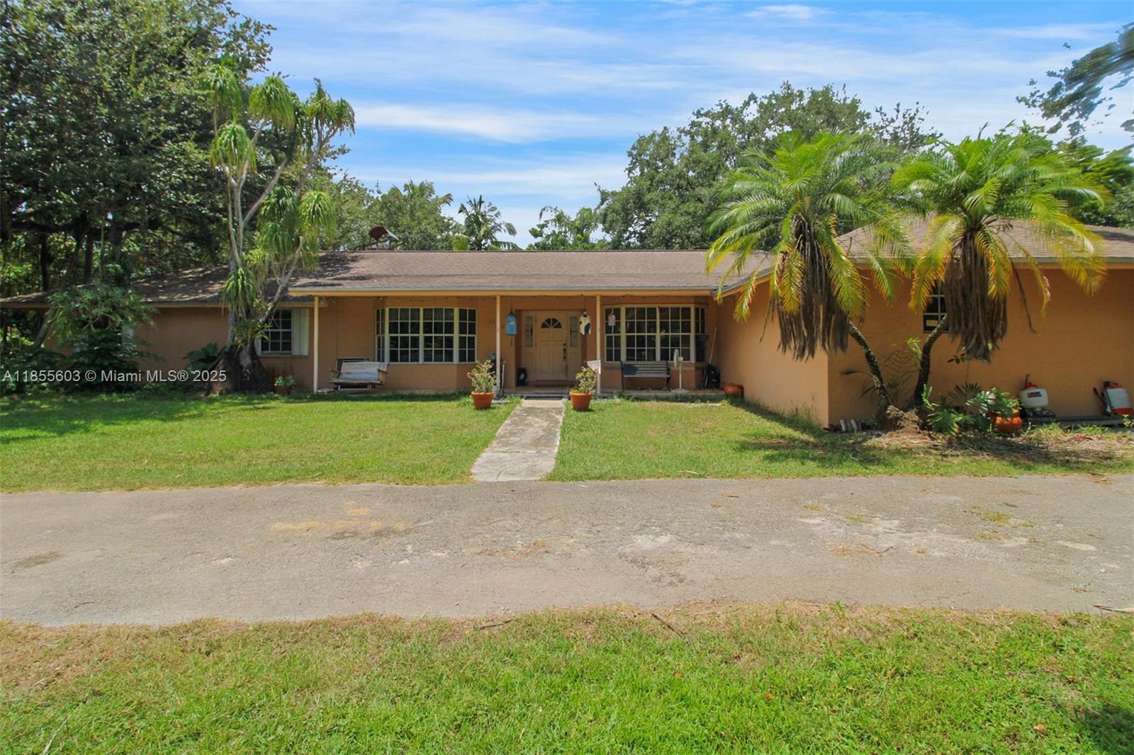 NO HOA! This is the Redland ya'll! Sought-after area but still close to it all, (just off 296 (Avocado) but off a very inconspicuous side road. This may be a handyman special in some ways but the roof is only 6 years old. You are being offered the rare chance to craft your dream estate in The Redland. Featuring 4B/2B w/ 2 car garage, this gem has LARGE living area (2921 FT -w/a total area of 4459 SF! The boathouse can be used as it's namesake or for your toys, equip, work trucks- & it's out of sight from the road. Nestled on a generous oversized acre lot (50,094 SF), this home is brimming w/potential for the visionary buyer. Whether you’re looking to restore its charm or modernize it entirely, the possibilities here are endless. RV parking. Equipment parking. Room for a pool. Good bones!
