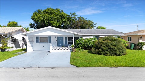 Photo of 4517 NW 47th Ter, Tamarac, FL 33319 (MLS # A12098527)
