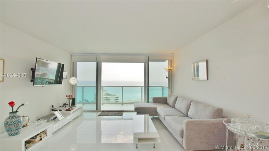 Fully remodeled and tasteful, modern condo at Arlen House East Building, with jaw-dropping direct views of the ocean! An airy one-bedroom with en-suite and guest bathroom, wall-to-wall white glass flooring. New kitchen with stainless steel top-line appliances, quartz countertops, glass-tiled backsplash, new modern furniture throughout... the pictures don't lie! Large balcony accessed from both bedroom and living area to enjoy the sunrise and sea breeze from!