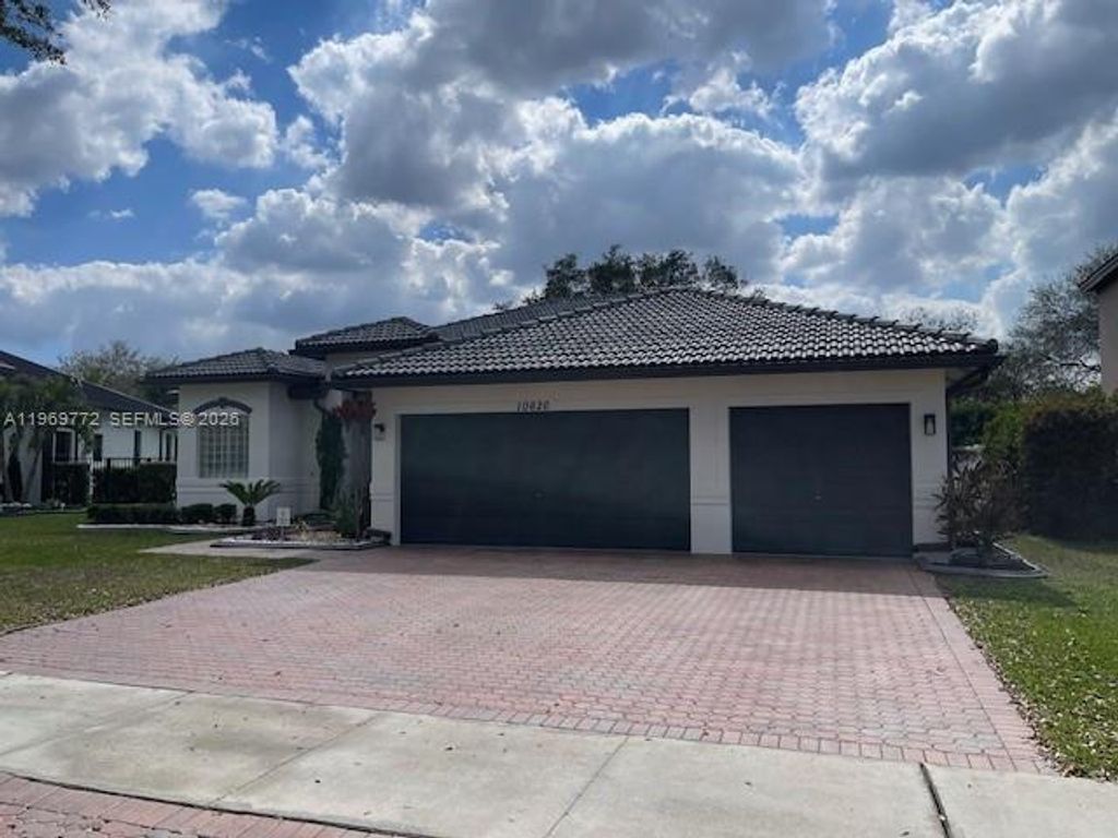 Photo of 10620 NW 56th Ct, Coral Springs, FL 33076 (MLS # A11969772)