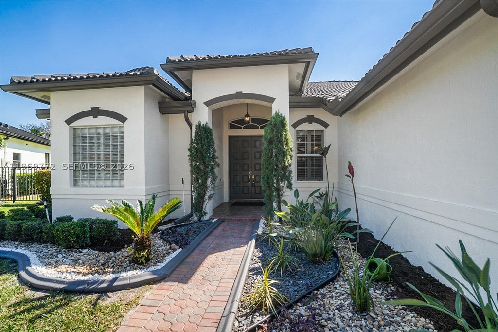 Photo of 10620 NW 56th Ct, Coral Springs, FL 33076 (MLS # A11969772)