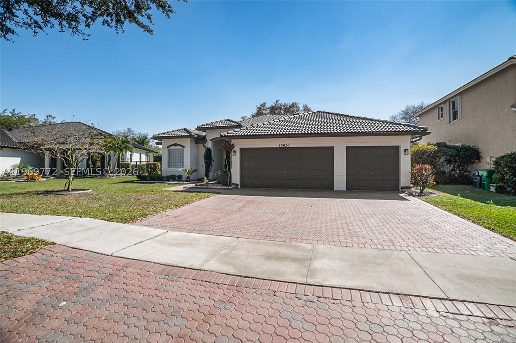Photo of 10620 NW 56th Ct, Coral Springs, FL 33076 (MLS # A11969772)