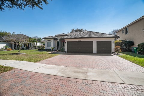 Photo of 10620 NW 56th Ct, Coral Springs, FL 33076 (MLS # A11969772)