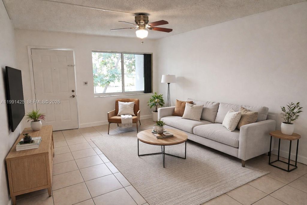 Photo of 3235 NW 102nd Ter #3235, Coral Springs, FL 33065 (MLS # A11991425)