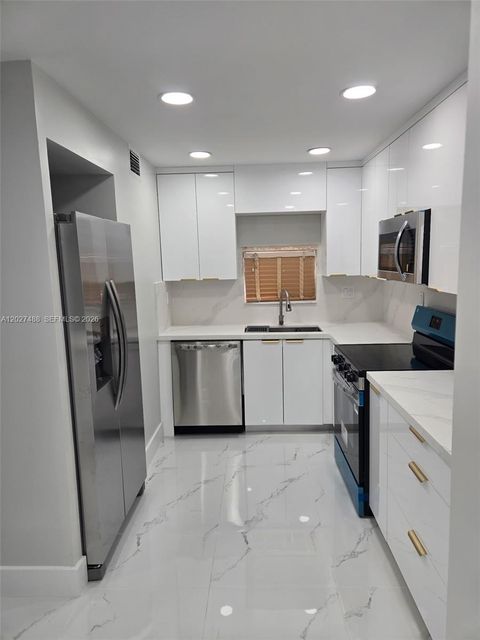 Photo of 700 S Hollybrook Dr #207, Pembroke Pines, FL 33025 (MLS # A12027488)