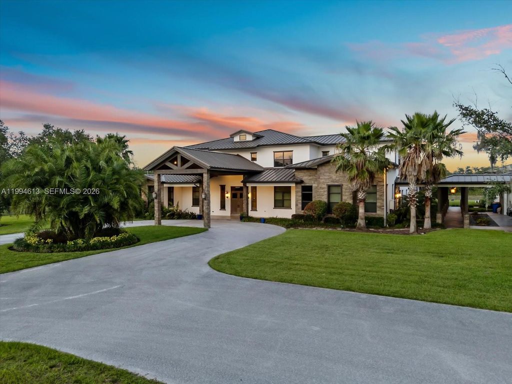 Photo of 16675 C 24 Canal Rd, Port St Lucie, FL 34987 (MLS # A11994613)