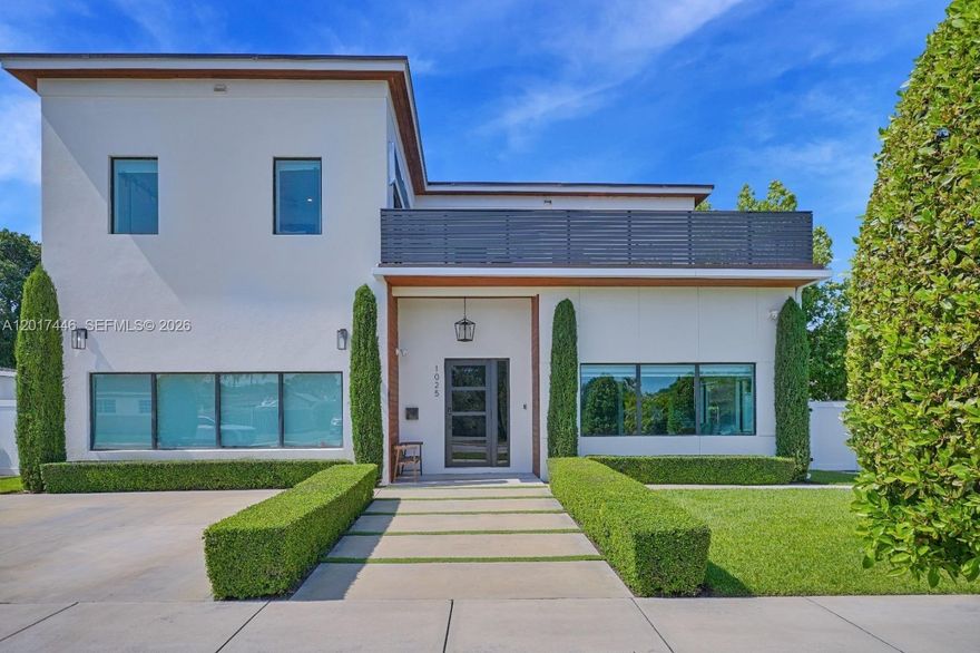 Stunning new construction two-story home in the heart of North Miami Beach featuring luxury finishes and thoughtfully designed modern living spaces throughout. This spacious residence offers soaring high ceilings, an open-concept layout, and seamless indoor/outdoor entertaining. Gourmet chef-style kitchen includes premium appliances, pot filler, two sinks, two dishwashers, oversized walk-in pantry, and kitchen pass-through windows that open directly to the backyard creating the perfect indoor/outdoor bar experience. Home is equipped with natural gas and sewer connection and includes exterior gas hookup and piping ready for a future outdoor kitchen installation. Enjoy a resort-style backyard with private pool, outdoor shower, outdoor sound system, and direct access from the pool area into a bathroom for added convenience. Additional features include two washer/dryer sets, elegant dining room with sink area, multiple balconies, and spacious living areas filled with natural light. Located in a peaceful and relaxed neighborhood close to houses of worship, shopping, dining, parks, schools, and major roadways. Designed with both functionality and luxury in mind, this exceptional home offers upscale South Florida living at its finest.