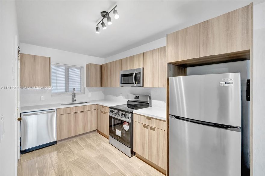 Condo on the 1st floor of a boutique building in Hollywood. Recently renovated with new kitchen cabinets, new stainless steel appliances, and new high-impact windows. Two ample closets in the main bedroom. The building offers controlled access, an elevator, and laundry onsite, and is conveniently close to Young Circle Park, supermarkets, restaurants, major highways, and a short drive to the beach. It comes with one assigned parking space, with street parking also available. Make this your new home!