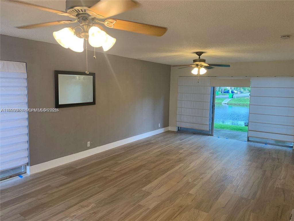 Photo of 3641 NW 95th Ter #1001, Sunrise, FL 33351 (MLS # A11929578)