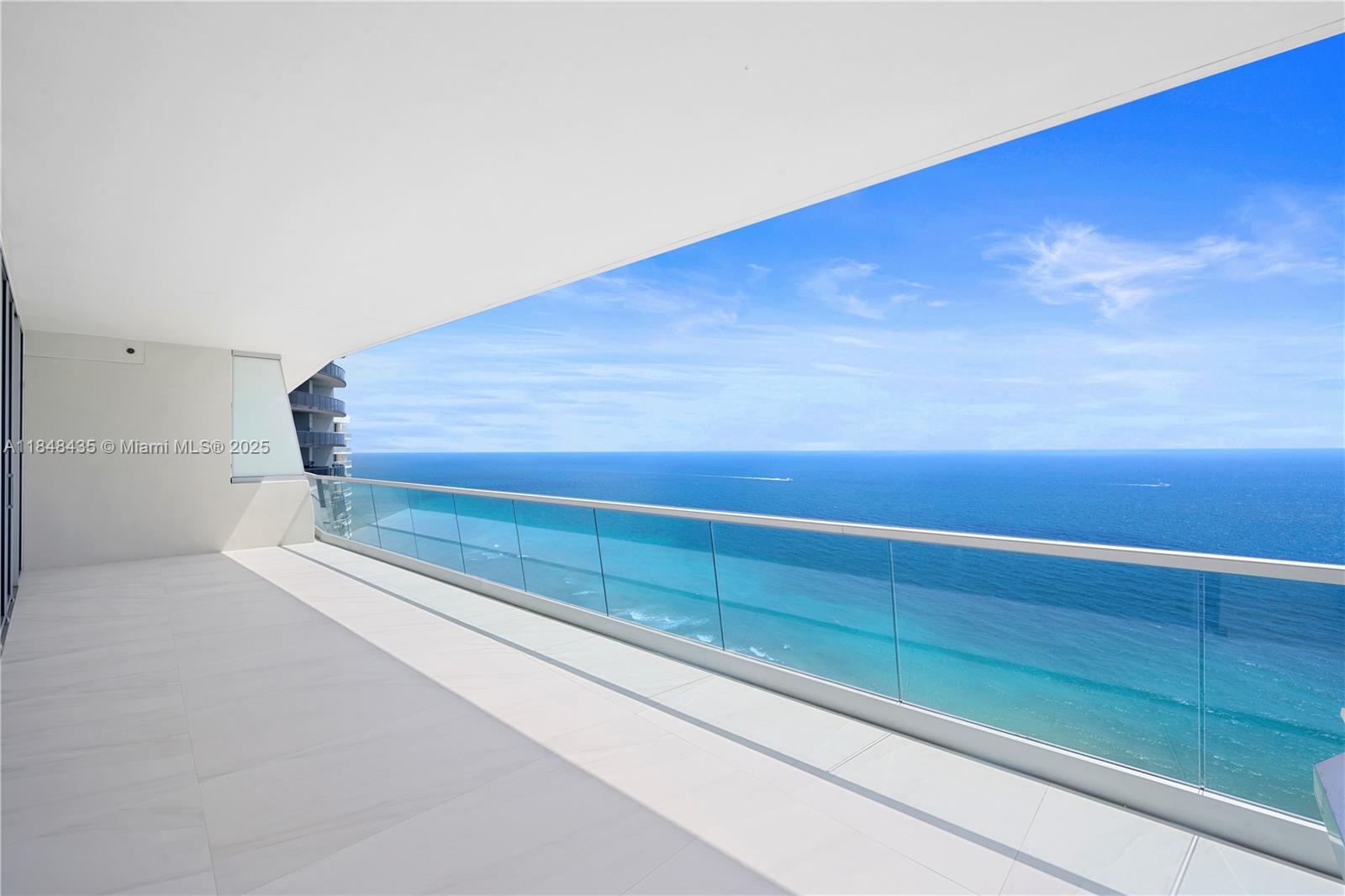 Ocean luxury reaches new heights in this 3-Bed + Den, 4.5-Bath flow-through residence at the prestigious Turnberry Ocean Club. Spanning 3,110 SqFt, this home features high ceilings, Italian cabinetry, Gaggenau appliances, sleek porcelain floors, and expansive balconies with Ocean and Intracoastal views. Entertain effortlessly with a summer kitchen and unwind in refined, light-filled interiors. Residents enjoy over 70,000 SqFt of world-class amenities, including a private 3-story Sky Club, sunrise/sunset pools, fine dining, full-service spa, beach and pool service, state-of-the-art fitness center, and private theater. A true statement of elegance.