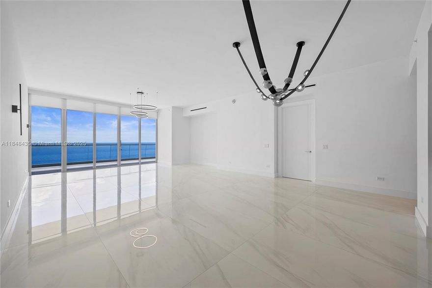 Ocean luxury reaches new heights in this 3-Bed + Den, 4.5-Bath flow-through residence at the prestigious Turnberry Ocean Club. Spanning 3,110 SqFt, this home features high ceilings, Italian cabinetry, Gaggenau appliances, sleek porcelain floors, and expansive balconies with Ocean and Intracoastal views. Entertain effortlessly with a summer kitchen and unwind in refined, light-filled interiors. Residents enjoy over 70,000 SqFt of world-class amenities, including a private 3-story Sky Club, sunrise/sunset pools, fine dining, full-service spa, beach and pool service, state-of-the-art fitness center, and private theater. A true statement of elegance. Some photos in this listing have been virtually staged to illustrate the property’s potential.