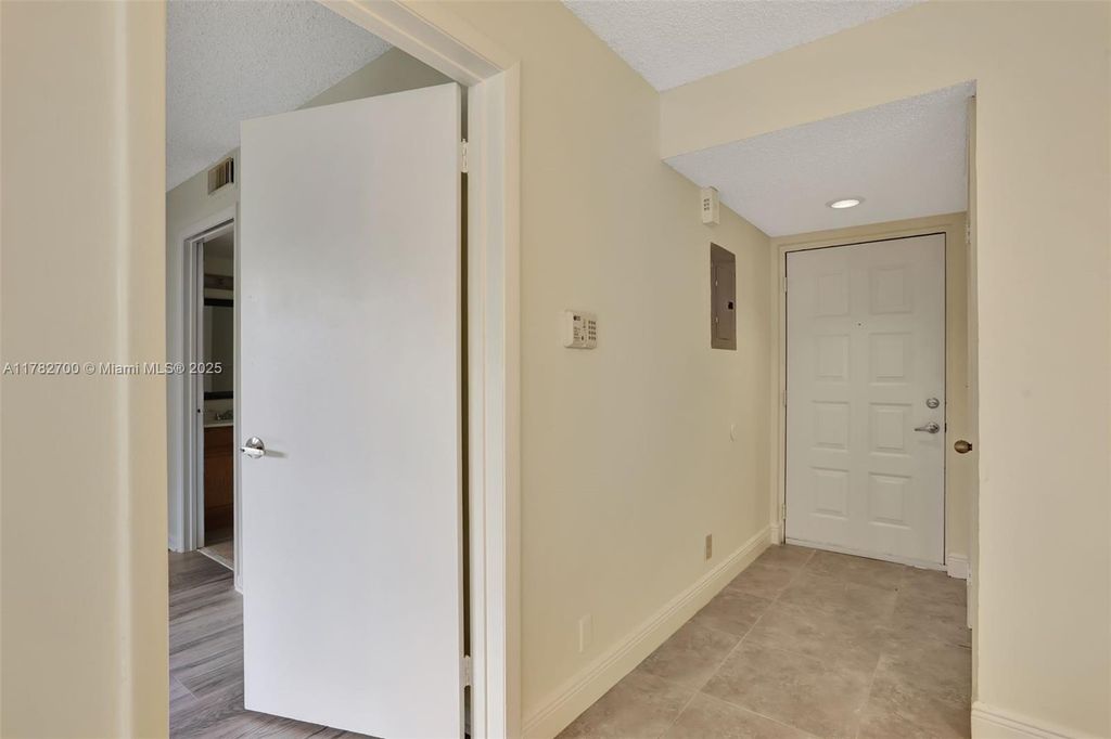 Photo of 8891 Wiles Rd #102, Coral Springs, FL 33067 (MLS # A11782700)