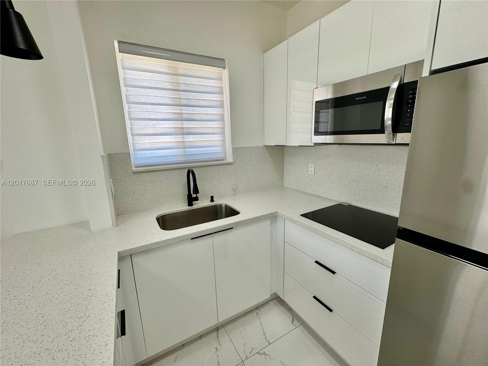 View photos, virtual tours, details... 421 NW 13th Ave A