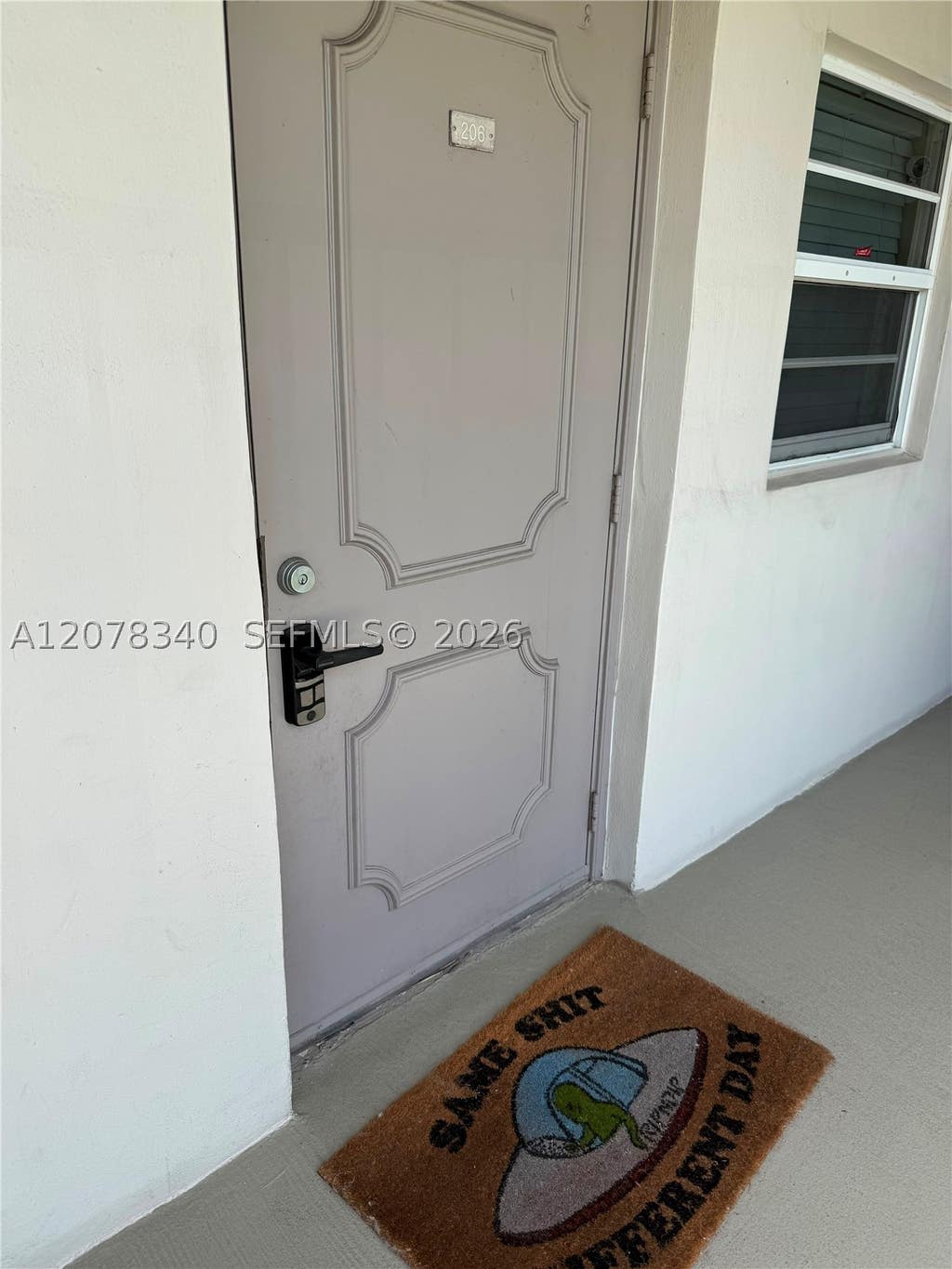 Photo of 9420 Poinciana Pl #206, Davie, FL 33324 (MLS # A12078340)