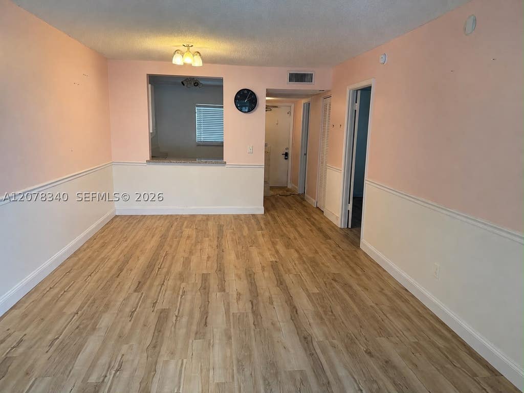 Photo of 9420 Poinciana Pl #206, Davie, FL 33324 (MLS # A12078340)