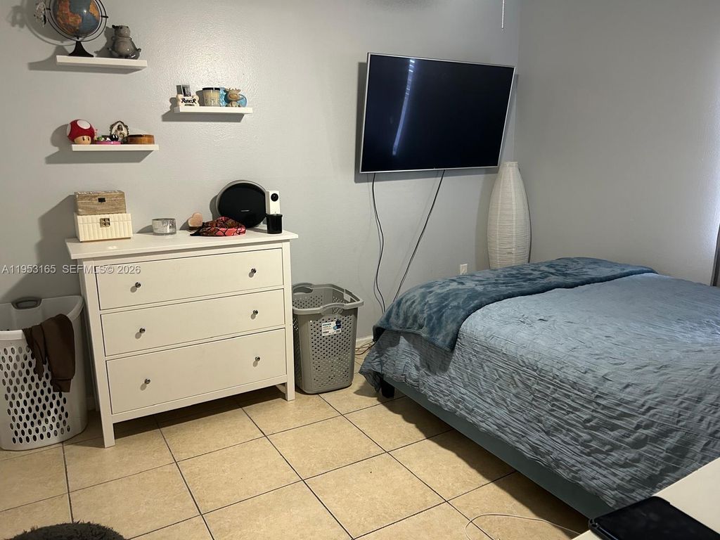 Photo of 8350 Sands Point Blvd #E101, Tamarac, FL 33321 (MLS # A11953165)