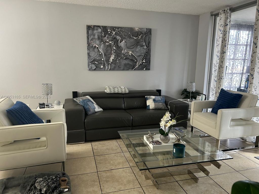 Photo of 8350 Sands Point Blvd #E101, Tamarac, FL 33321 (MLS # A11953165)