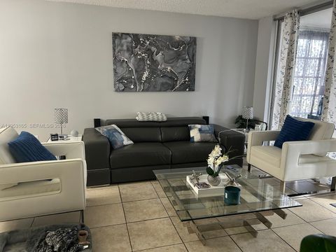 Photo of 8350 Sands Point Blvd #E101, Tamarac, FL 33321 (MLS # A11953165)