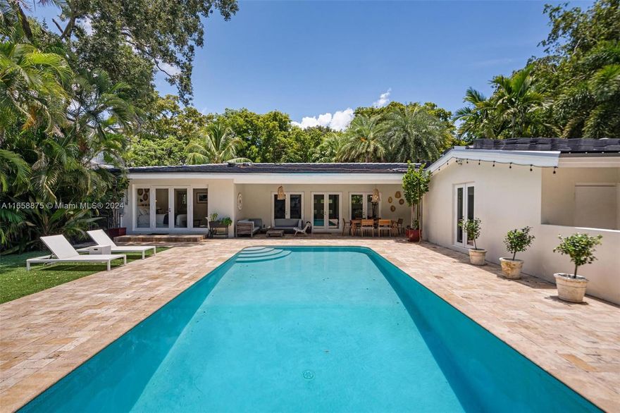 LOOK NO FURTHER! Contemporary 4 bedrooms/ 3 bathrooms home in one of the most desired areas of South Coral Gables. Conveniently located at a close distance from shops, restaurants, and some of the best private and public schools. The house offers a spacious and open layout with plenty of natural light and high-end finishes. Situated on a large 12300 sqft corner lot, step outside and you'll find a spacious yard, a covered patio, and a stunning large pool, all embraced by a thriving green landscape perfect for family living and entertaining. The lush foliage surrounding the pool ensures privacy making it the perfect place to relax and unwind. A large 2 car garage with windows. House freshly painted, New Roof! Perfect South Gables location within the official Sunset Elementary boundary.