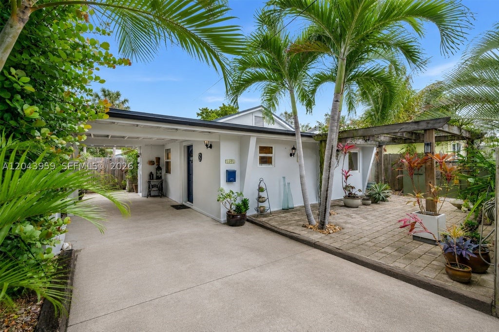 Photo of 1401 NE 33rd St, Oakland Park, FL 33334 (MLS # A12043959)
