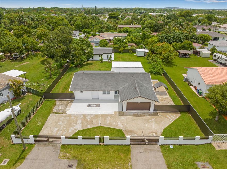 Beautifully updated 3-bedroom, 2-bath home situated on a spacious half-acre lot in Miami. This property features modern upgrades throughout and offers plenty of space both inside and out. The fully fenced yard provides privacy and room for outdoor activities, boats, RVs, or future improvements. In addition to the main home, the property includes a guest quarters and additional living space, making it perfect for extended family or potential rental income. Conveniently located near major roads, shopping, and schools. Great opportunity for homeowners or investors