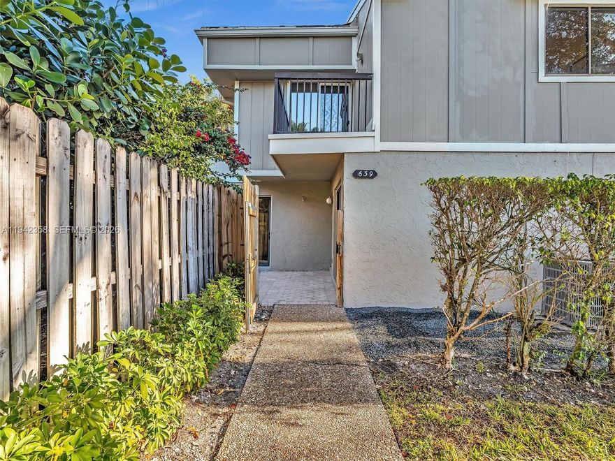 Welcome to this beautifully renovated 2-bedroom, 2-bathroom townhouse located in one of Plantation’s most desirable neighborhoods. Perfectly positioned near Sawgrass Mills Mall, top-rated restaurants, shopping, and major highways, this home offers both convenience and lifestyle.

Step inside to discover a modern, open-concept layout featuring stylish water resistant vinyl flooring throughout and abundant natural light. The fully updated kitchen is a standout, showcasing quartz countertops, sleek stainless steel appliances, ample cabinetry, and a seamless flow into the living and dining areas—ideal for both everyday living and entertaining.

Both bathrooms have been tastefully upgraded with contemporary finishes, providing a clean and elegant feel. The spacious primary bedroom offers a private retreat complete with a balcony, perfect for enjoying your morning coffee or unwinding in the evening.

Additional highlights include a fenced private yard, ideal for outdoor dining, gardening, or relaxing in your own personal space. This townhome combines modern upgrades with functional living and outdoor enjoyment.

Whether you’re a first-time buyer, downsizing, or investing, this move-in-ready home checks all the boxes. Don’t miss the opportunity to own a turnkey property in a prime Plantation location close to everything South Florida has to offer.