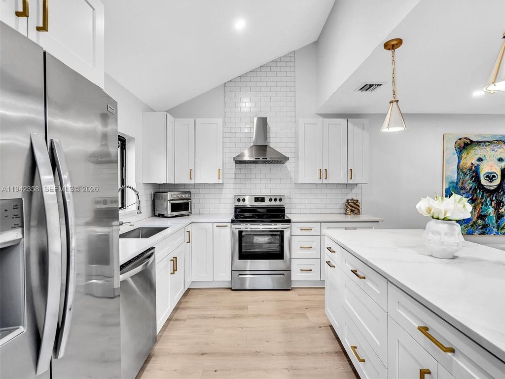 Photo of 639 NW 132nd Ter, Plantation, FL 33325 (MLS # A11942358)