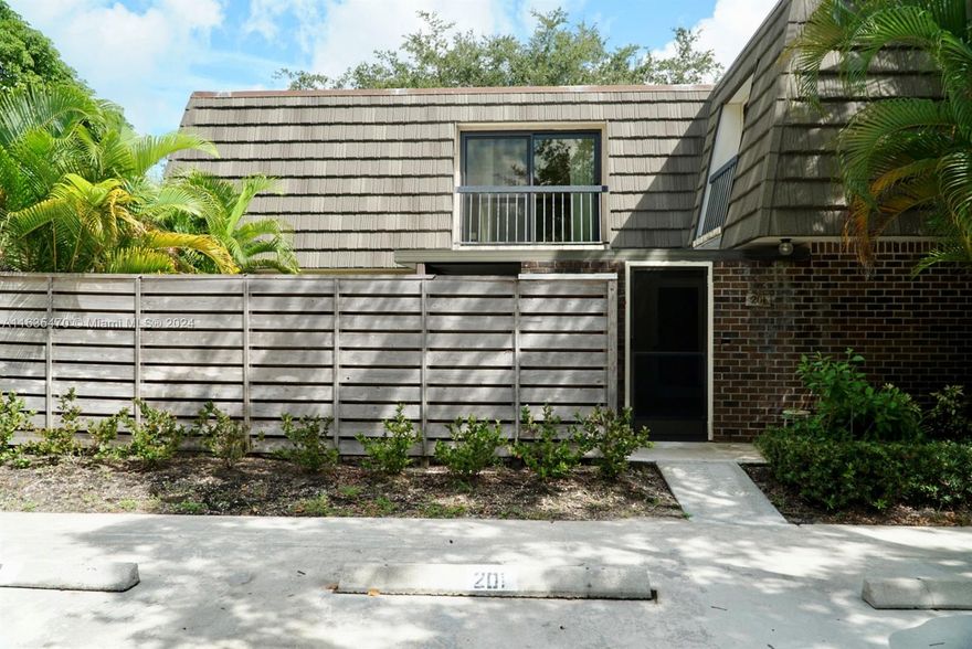 Experience the charm of this beautifully updated townhouse in a private setting. This 2-bedroom, 2.5-bathroom home also features a versatile additional room that can serve as a den, office, or even a third bedroom. The home has been recently updated and freshly painted, featuring modern flooring, kitchen cabinets, stainless steel appliances, and a washer/dryer. Enjoy a spacious, fenced, and partially screened-in private patio perfect for entertaining or relaxing. Glenwood offers scenic walking/jogging trails, a community pool, tennis and pickleball courts, and a playground. Located in the sought-after PGA National, Glenwood is just minutes away from excellent shopping, fantastic dining options, beautiful beaches, and major highways. Ideal for golf enthusiasts. Come see for yourself!