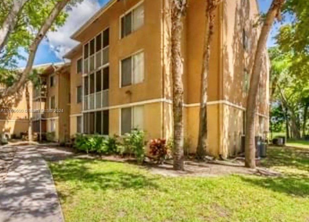 Photo of 3995 W Mcnab Rd #B107, Pompano Beach, FL 33069 (MLS # A11699600)