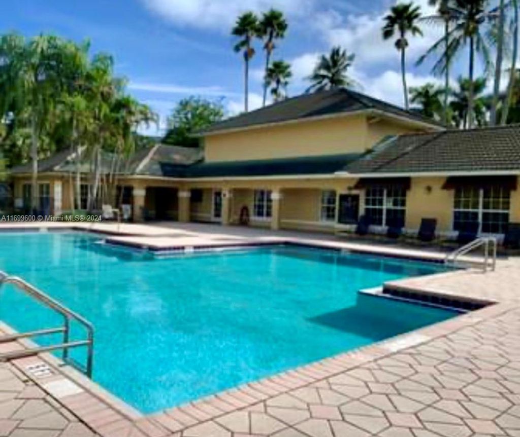 Photo of 3995 W Mcnab Rd #B107, Pompano Beach, FL 33069 (MLS # A11699600)