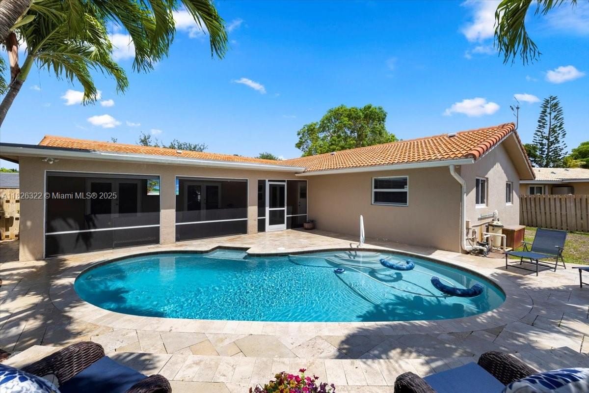This beautifully maintained 4 bed, 2 bath home offers 2,000 square feet of comfortable living in the Westchester neighborhood, known for its peaceful setting and convenient location. Inside, you will find a split floor plan, spacious living and dining areas, and an updated kitchen that is perfect for everyday living and entertaining. The backyard is a true highlight, featuring a screened-in patio and a private pool with an elegant travertine deck. It is the perfect space to relax, host gatherings, and enjoy Florida sunsets.
Move-in ready home comes with no HOA dues, offering added flexibility and value. Located close to parks, top-rated schools, dining, and shopping, this property combines comfort, style, and convenience.
Schedule your private showing today, homes like this do not last.