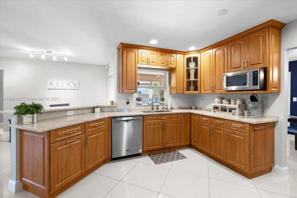 Photo of 2372 NW 120th Ln, Coral Springs, FL 33065 (MLS # A11826322)