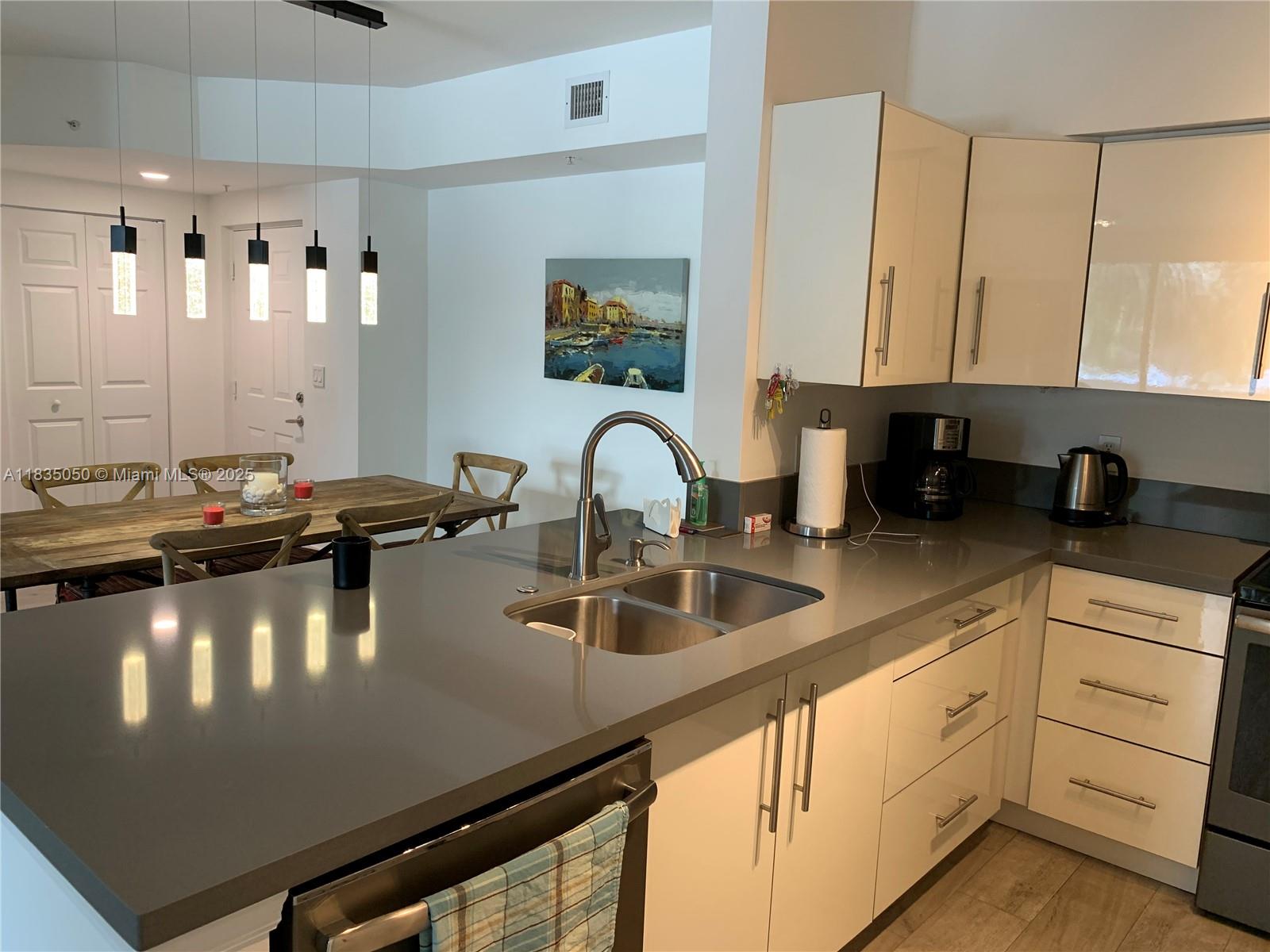 Beautifully Remodeled 2/2 Split Floor Plan with Stunning Intracoastal Views! This fully furnished unit features a modern open-concept layout with a contemporary kitchen, matte stainless steel app, and sleek gray quartz countertops. Master has a King size bed & two twin beds in the guest- perfect for comfort and flexibility. Completely updated with elegant Italian porcelain tile throughout and brand-new lighting fixtures. Both bathrooms have been tastefully renovated with stylish, on-trend finishes. Porto Bellagio has resort-style amenities: heated pool, lap pool, jacuzzis, NEW 24-hour fitness center, waterfront clubhouse, kids’ room, business center, and conference room. All this, and located just a short stroll to the beach, restaurants, cafés, shops, and more. Easy to show—call today!