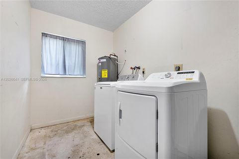 Tiny photo for 8765 SW 53rd St, Cooper City, FL 33328 (MLS # A12026641)